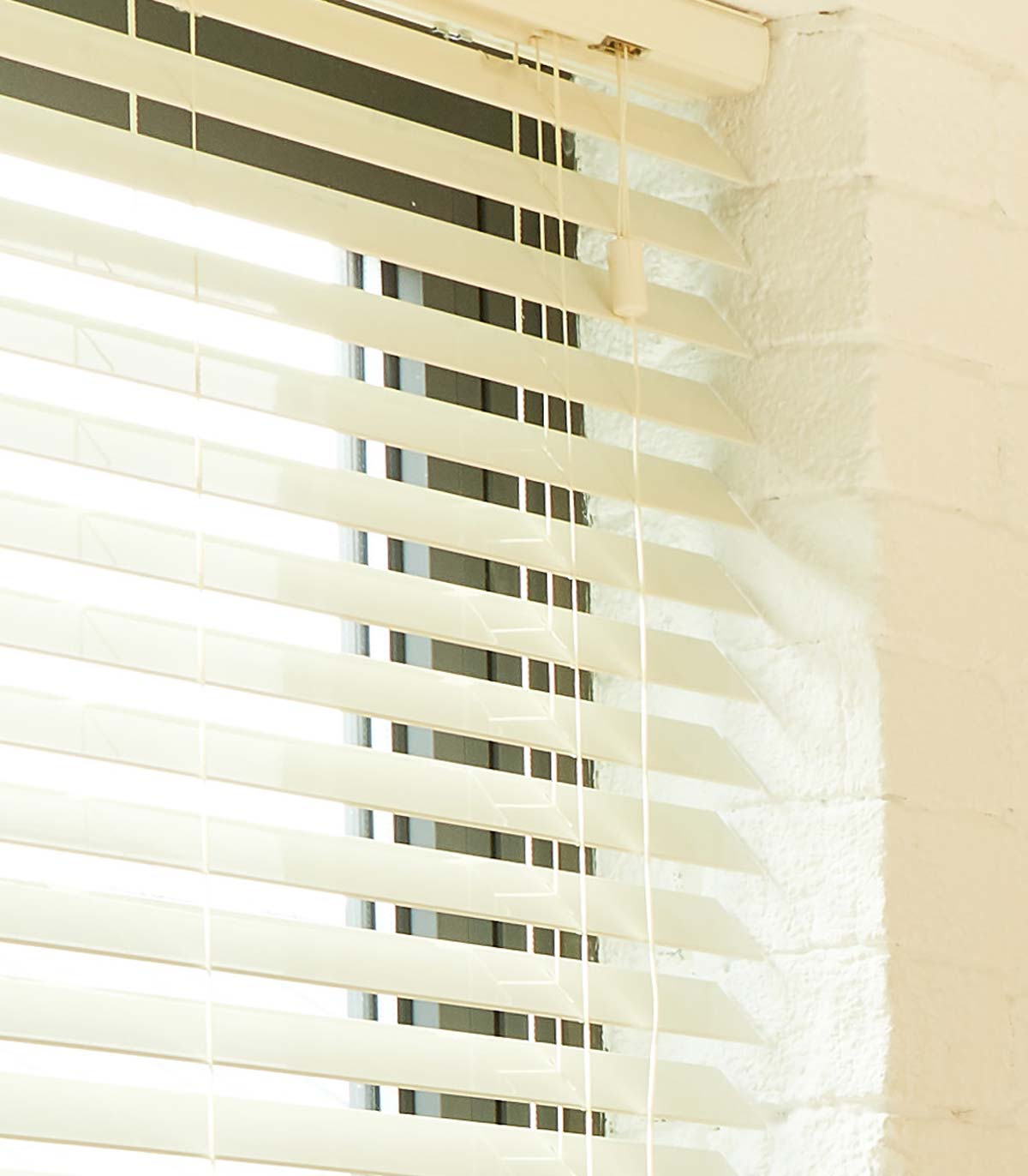 Cream faux wood blinds